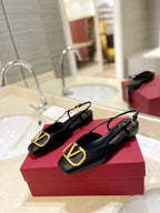 VLOGO BLACK LEATHER SLINGBACK FLATS