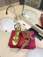 ROCKSTUD SANDAL WITH STRAP IN GOLD CALFSKIN 60 MM