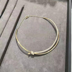 KNOT DOUBLE ROW NECKLACE IN YELLOW GOLD WITH DIAMONDS